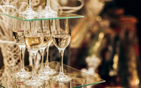 glasses of champagne places strategically on top of each other  