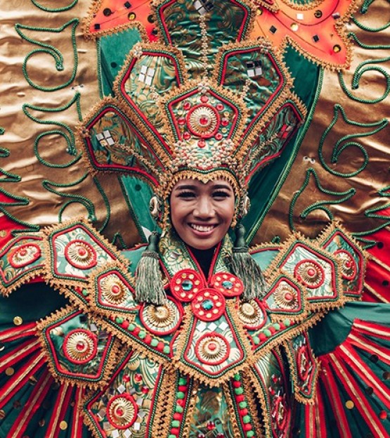 woman in traditional costume smiling 