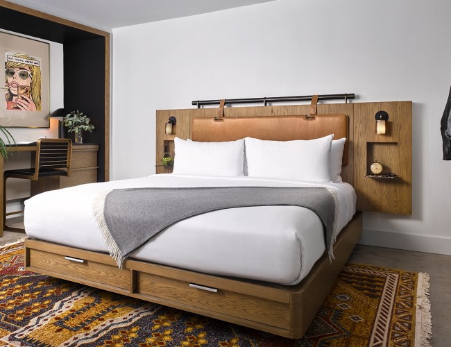 king size bed  with wooden head board 