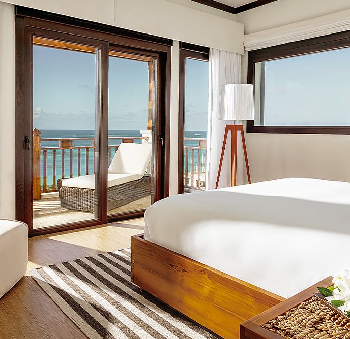 zemi beach interior view of bedroom and balcony